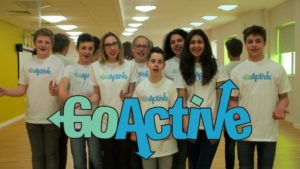A group of teenagers shouting. The word 'GoActive' is superimposed on the image